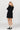 SALANIDA Merino Wool Pleated Mini Skirt in Black | PICCOLO